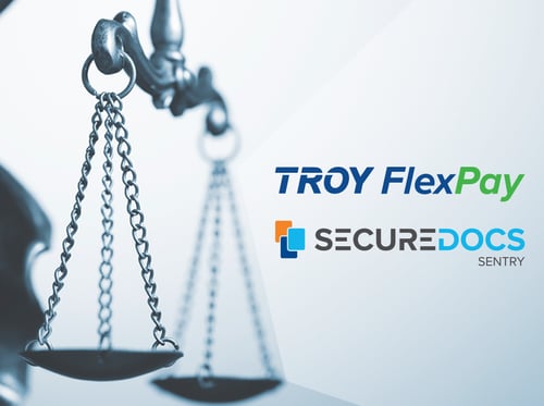 صورة لميزان قانوني مع شعاري TROY FlexPay وSecureDocs Sentry في مقدمة الجانب الأيمن